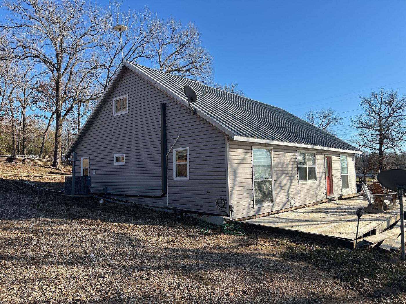 Before: Siding in Lake Limestone, Jewett, TX
