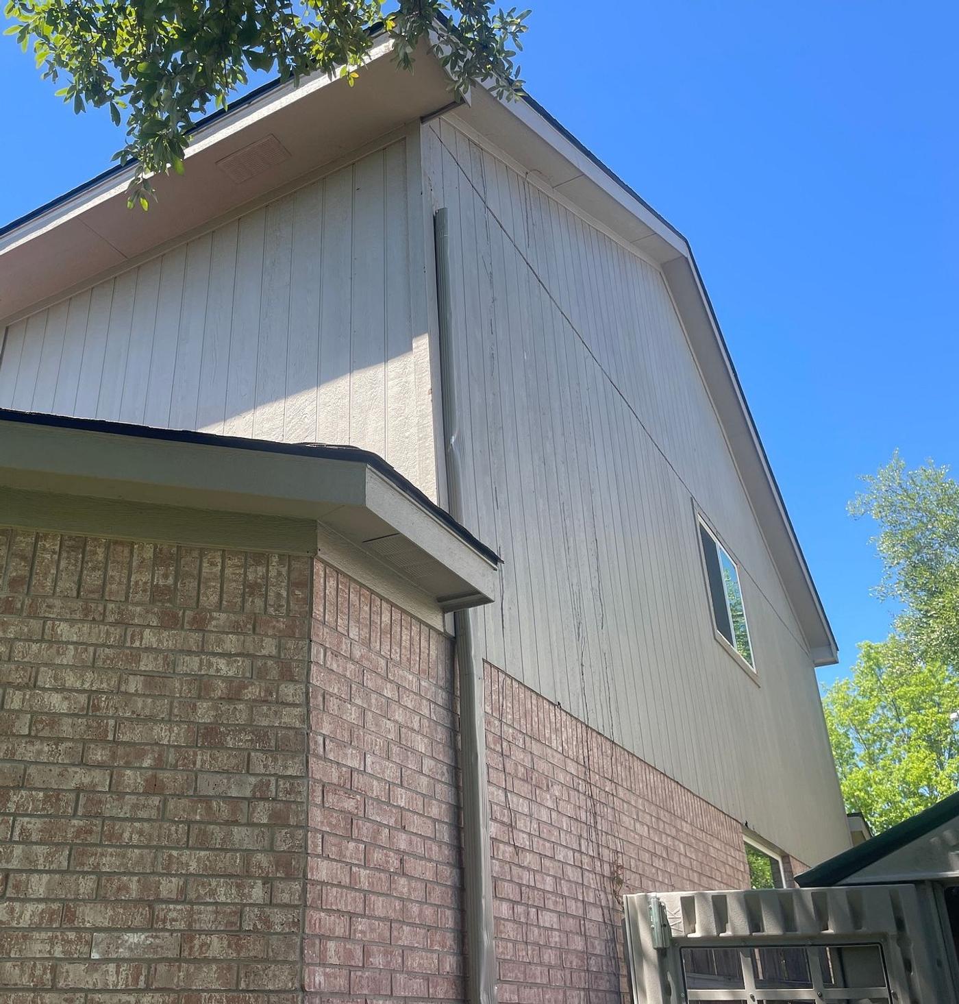 Before the windows & siding project — home exterior in Cat Hollow, Round Rock