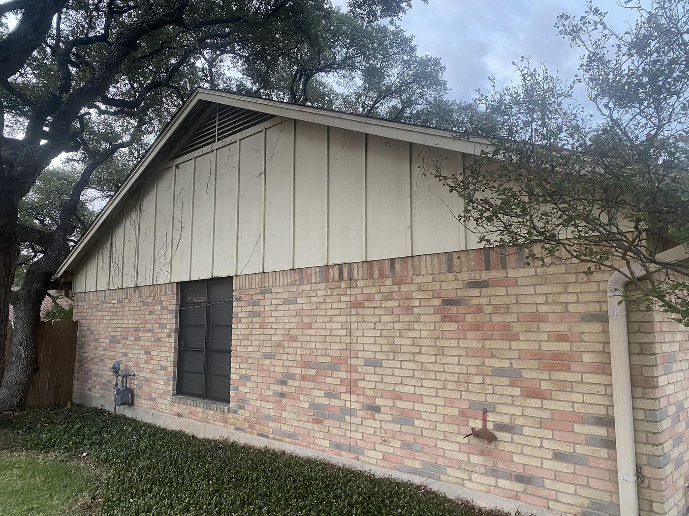 Before the siding & exterior painting project — home exterior in Mesa Park, Austin