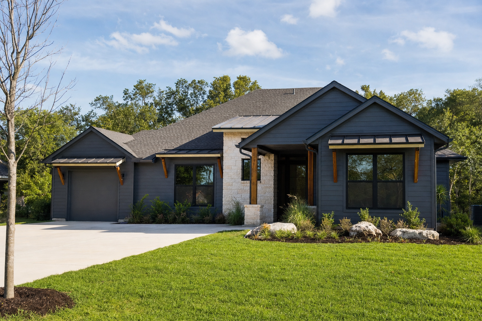 Modern home with dark charcoal gray exterior paint in direct sunlight