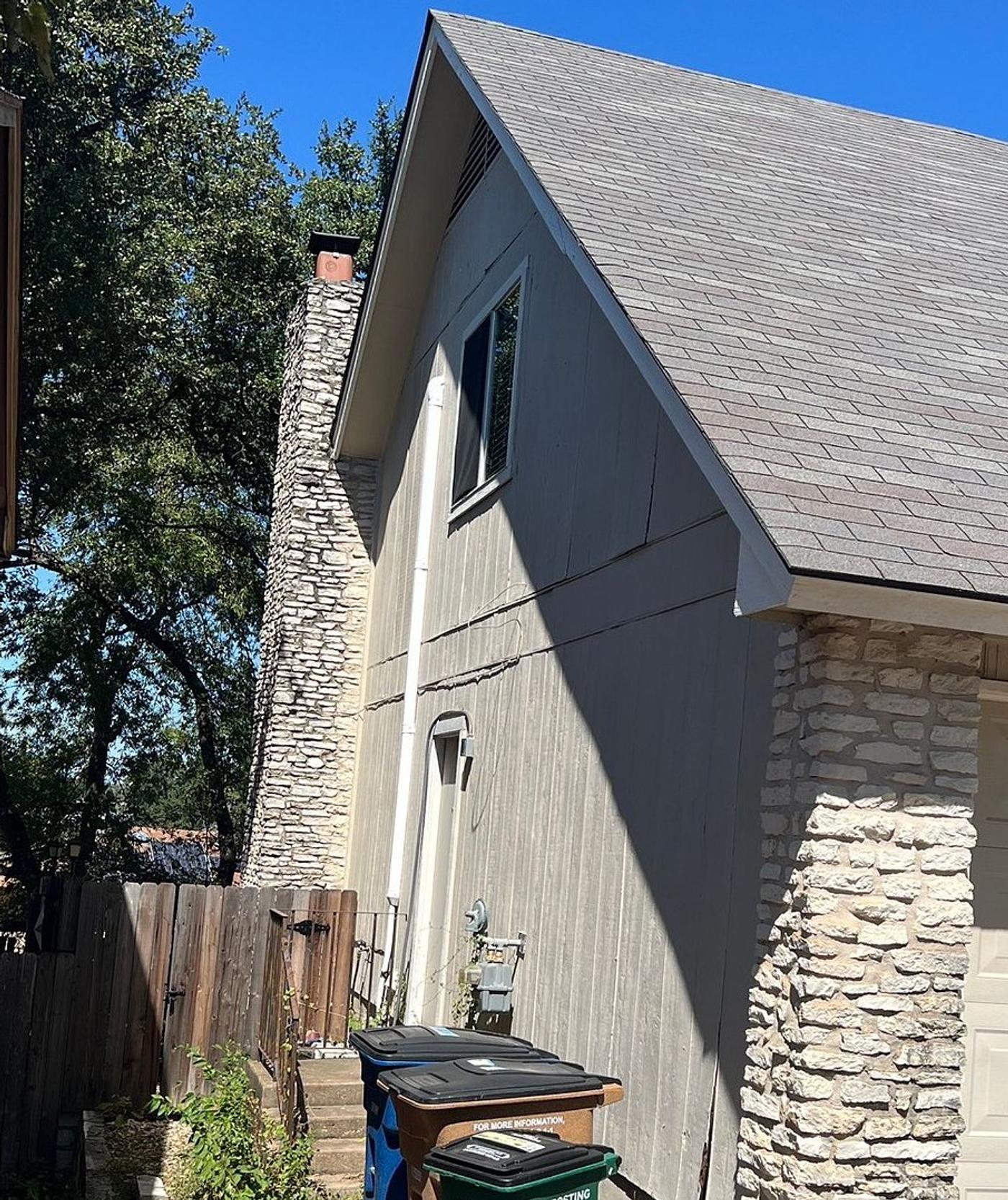 Before the siding & gutters project — home exterior in Dittmar-Slaughter, Austin