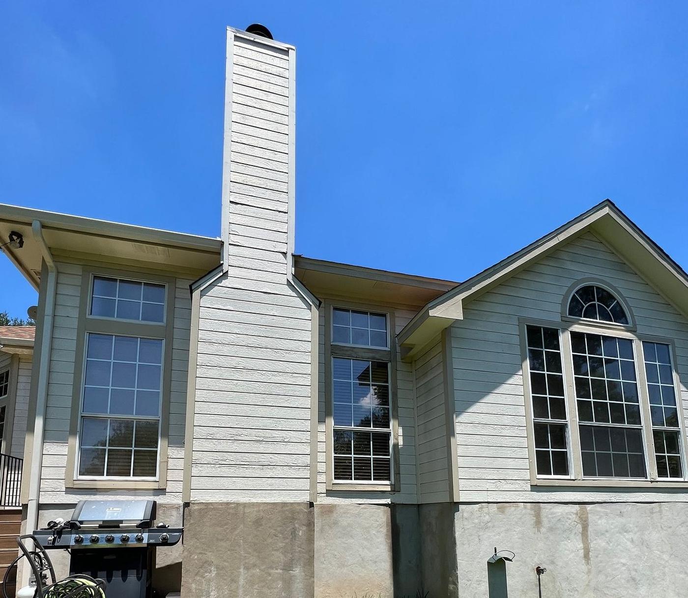 Before the siding & windows project — home exterior in Pflugerville