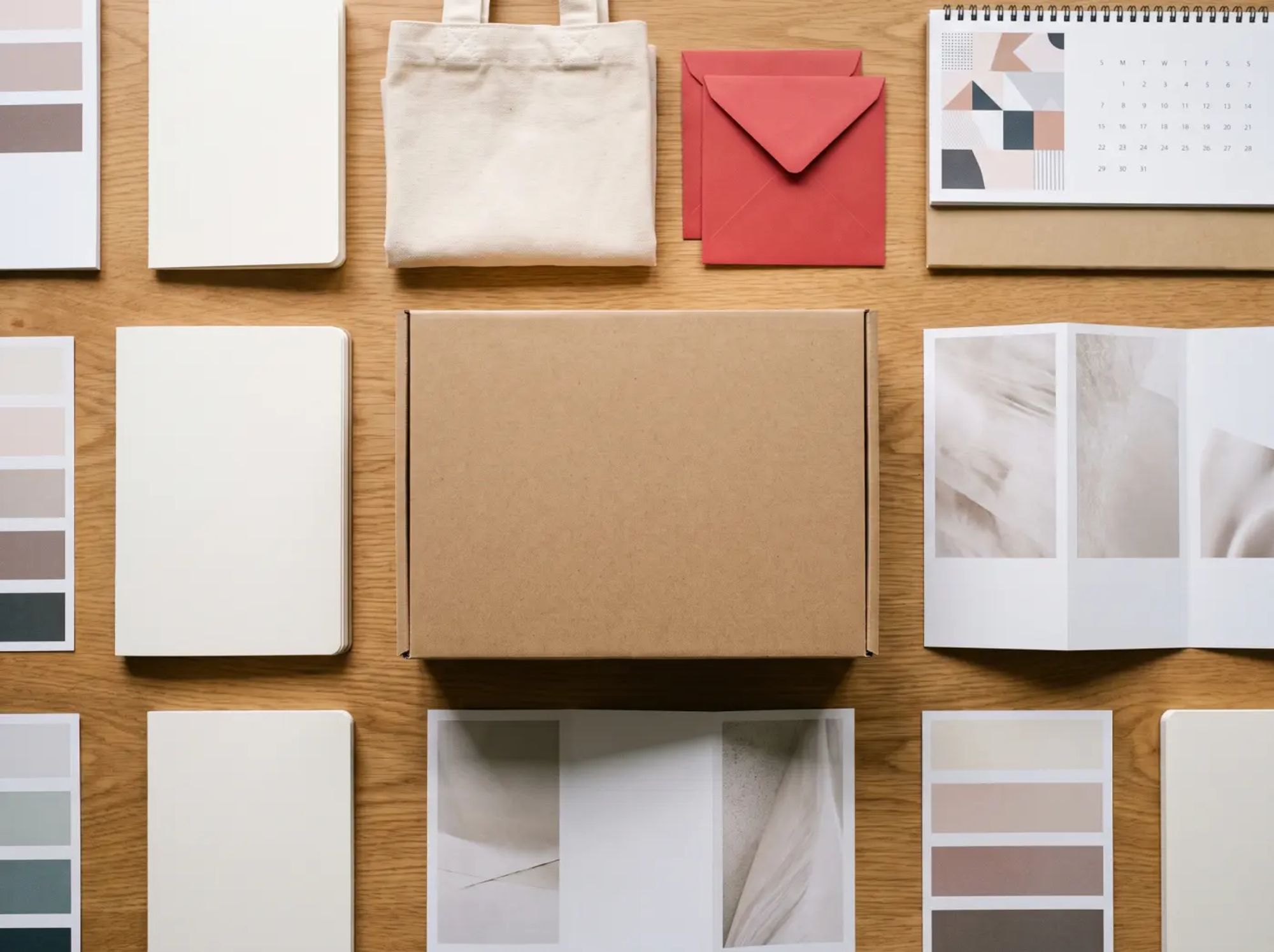 Branded gift box, notebooks, red packets and printed materials