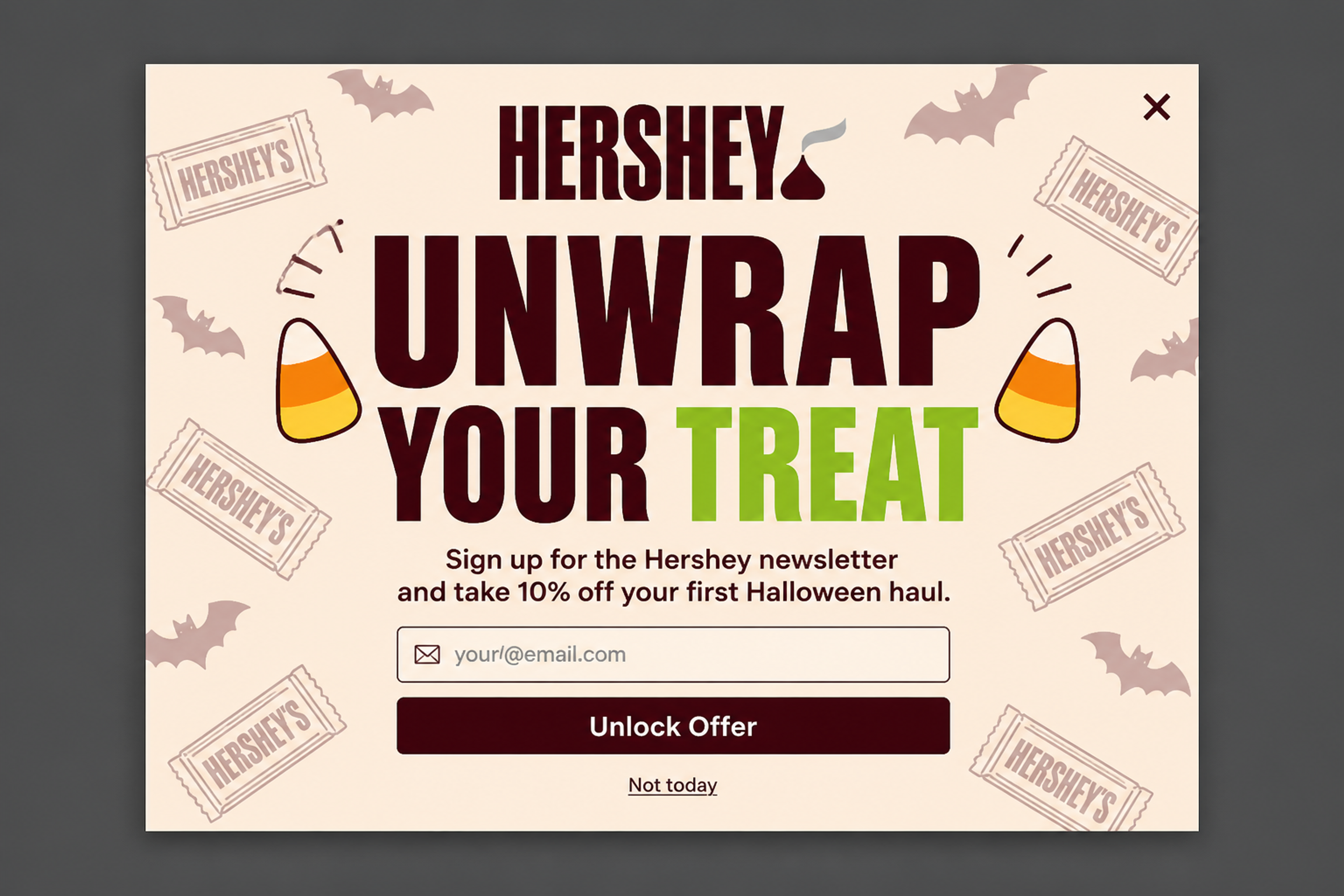 Type-led Halloween popup designed for Hershey's with "Unwrap your treat" headline and 10% off the first Halloween order