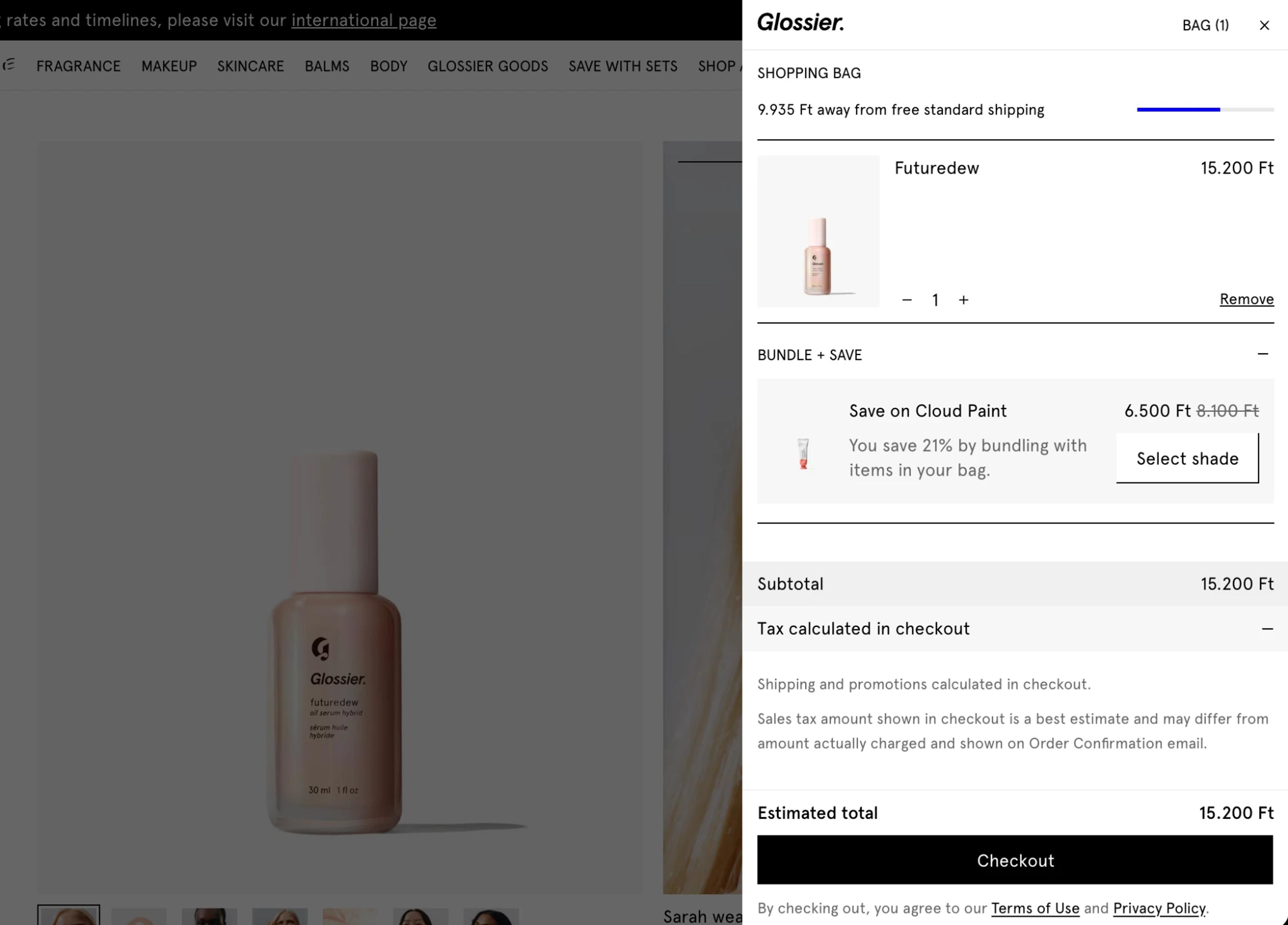 Glossier shopping bag with a free shipping progress bar and a Bundle + Save offer for a matching product