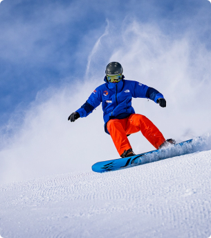 Person snowboarding down a mountain