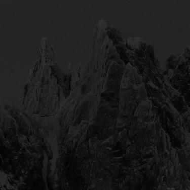 darkened image of mountains