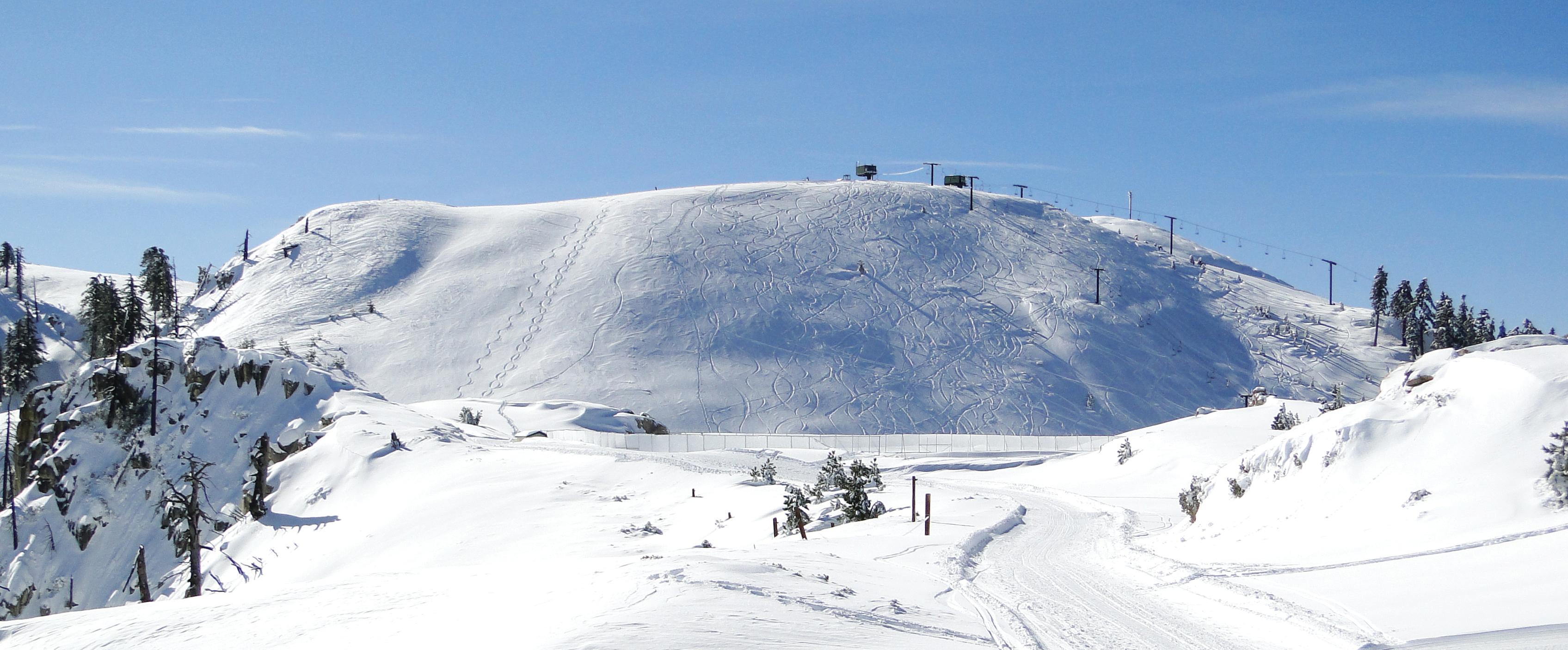 View of a snow-covered ski hill