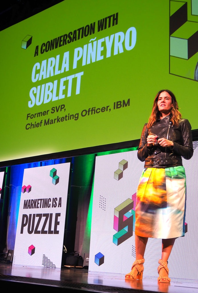 Carla Piñeyro Sublett on stage speaking during her C3 2022 keynote