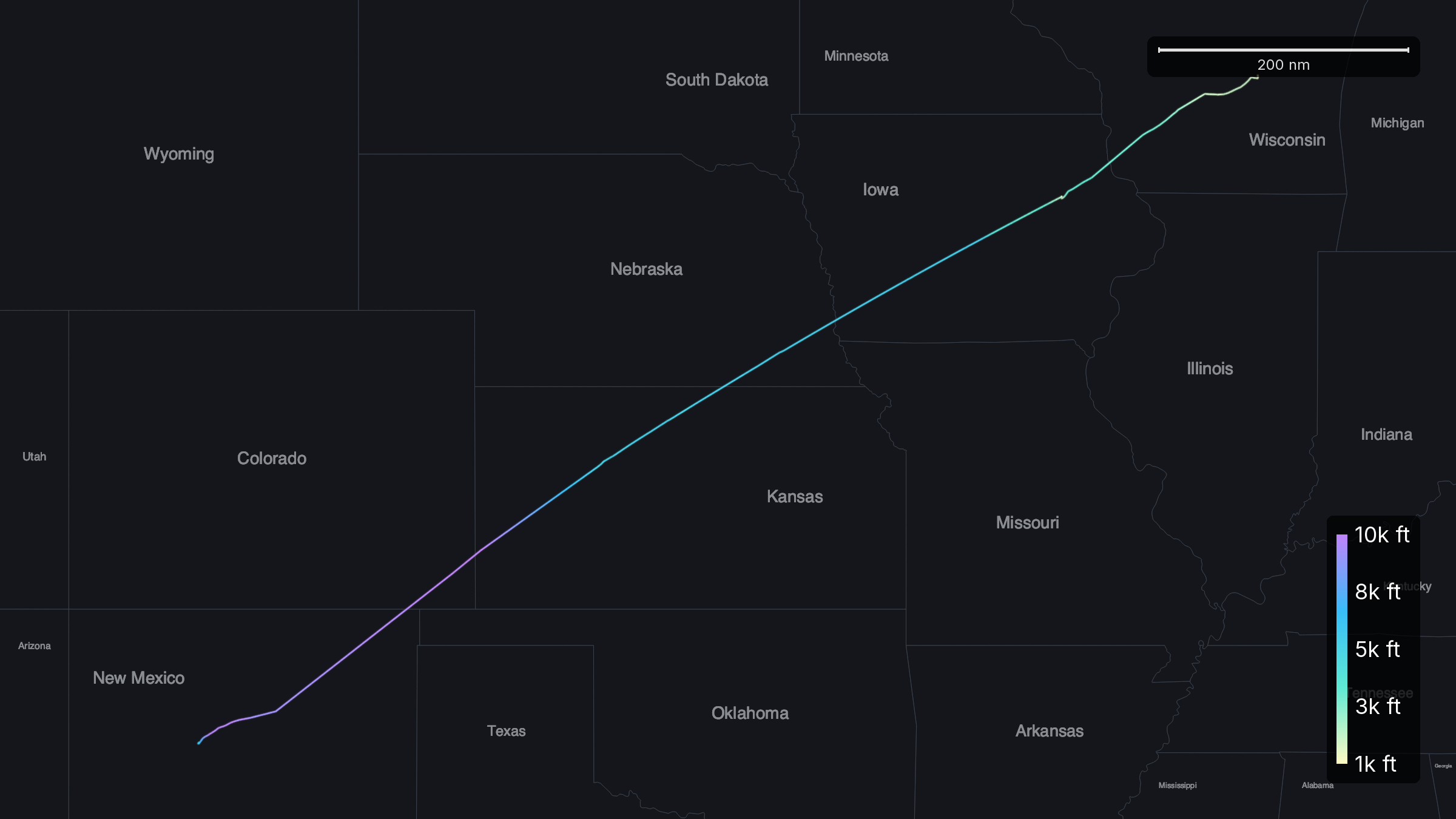 The single ADS-B track of N79NM, an amateur-built Vans RV-7A, running 994 nautical miles from Albuquerque, New Mexico northeast across Colorado, Kansas, Nebraska and Iowa to Oshkosh, Wisconsin, colored by altitude and never exceeding 9,875 feet.