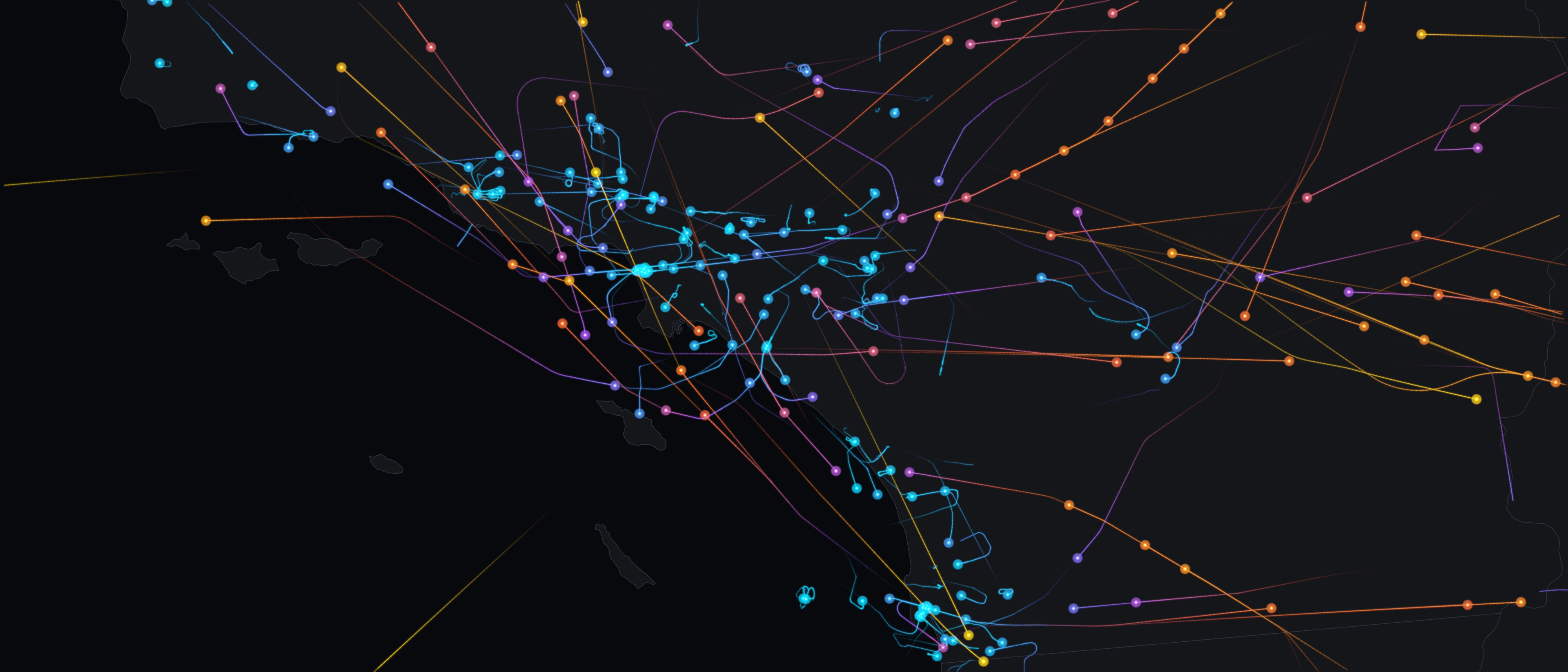 A single instant of real ADS-B traffic over Greater Los Angeles at 5:45 PM: 232 aircraft, each a dot at its position trailing a fading line of its last 12 minutes of flight, colored by altitude from low near the airports (cyan) up to high-altitude cruise (orange and gold), over the lit Southern California coastline.