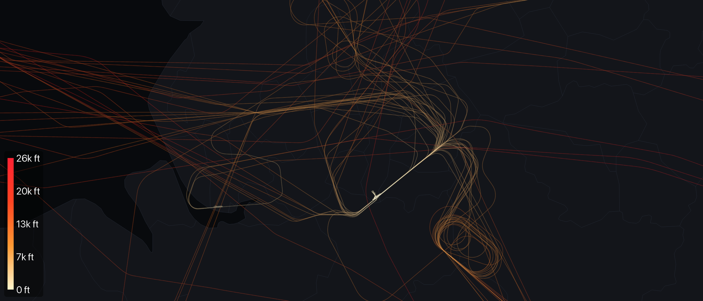Aircraft holding over Manchester on January 15, 2026, reconstructed from ADS-B tracks. 38 of 325 tracked aircraft flew racetrack loops at Manchester's three published stacks, DAYNE, MIRSI and ROSUN, in a warm palette. Tracks colored by altitude, with a scale at lower left.