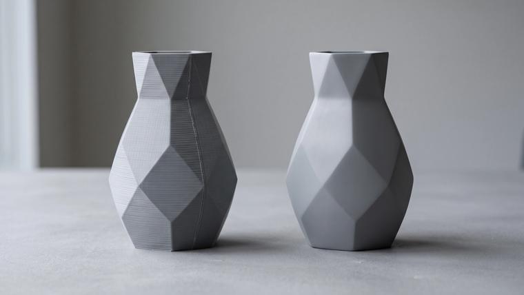The same 3D printed vase shown twice, one with visible layer lines and one sanded and primed to a smooth finish