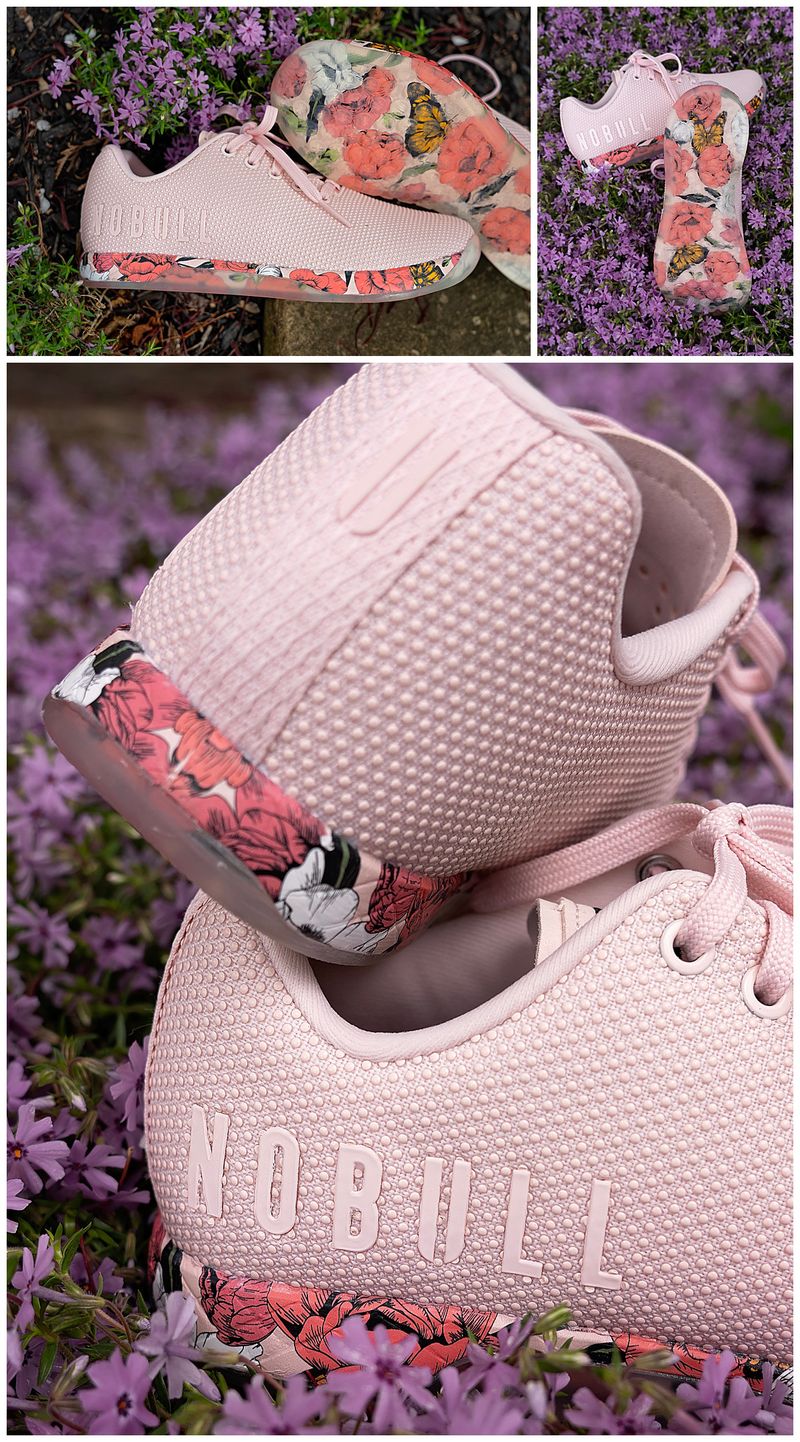 details of a pink athletic shoe with flower sole