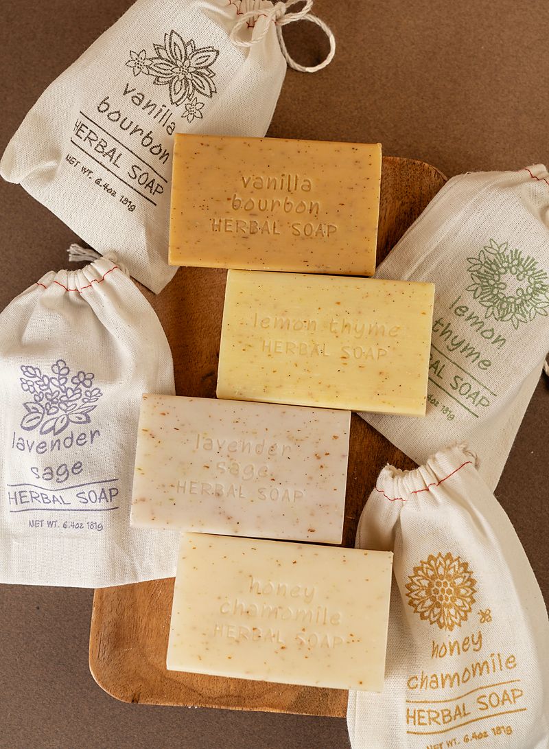Herbal soap on a wooden tray