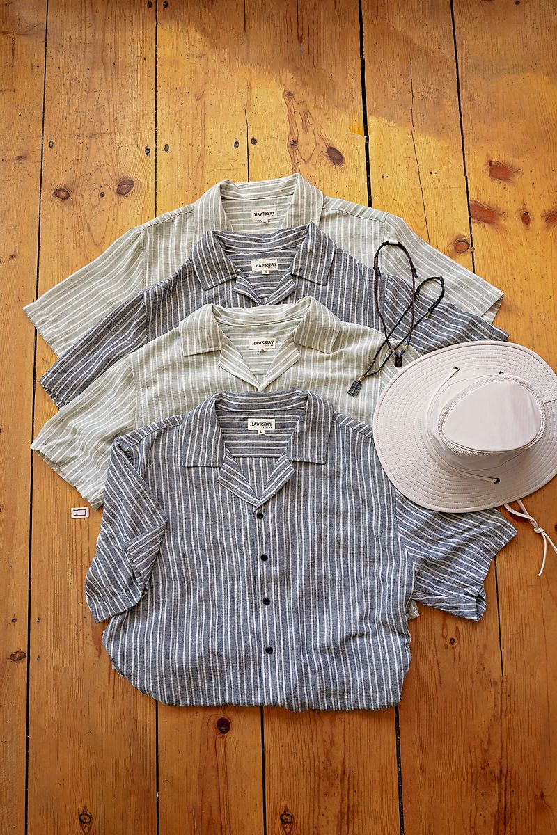 mens shirts for a product photo on a wood floor