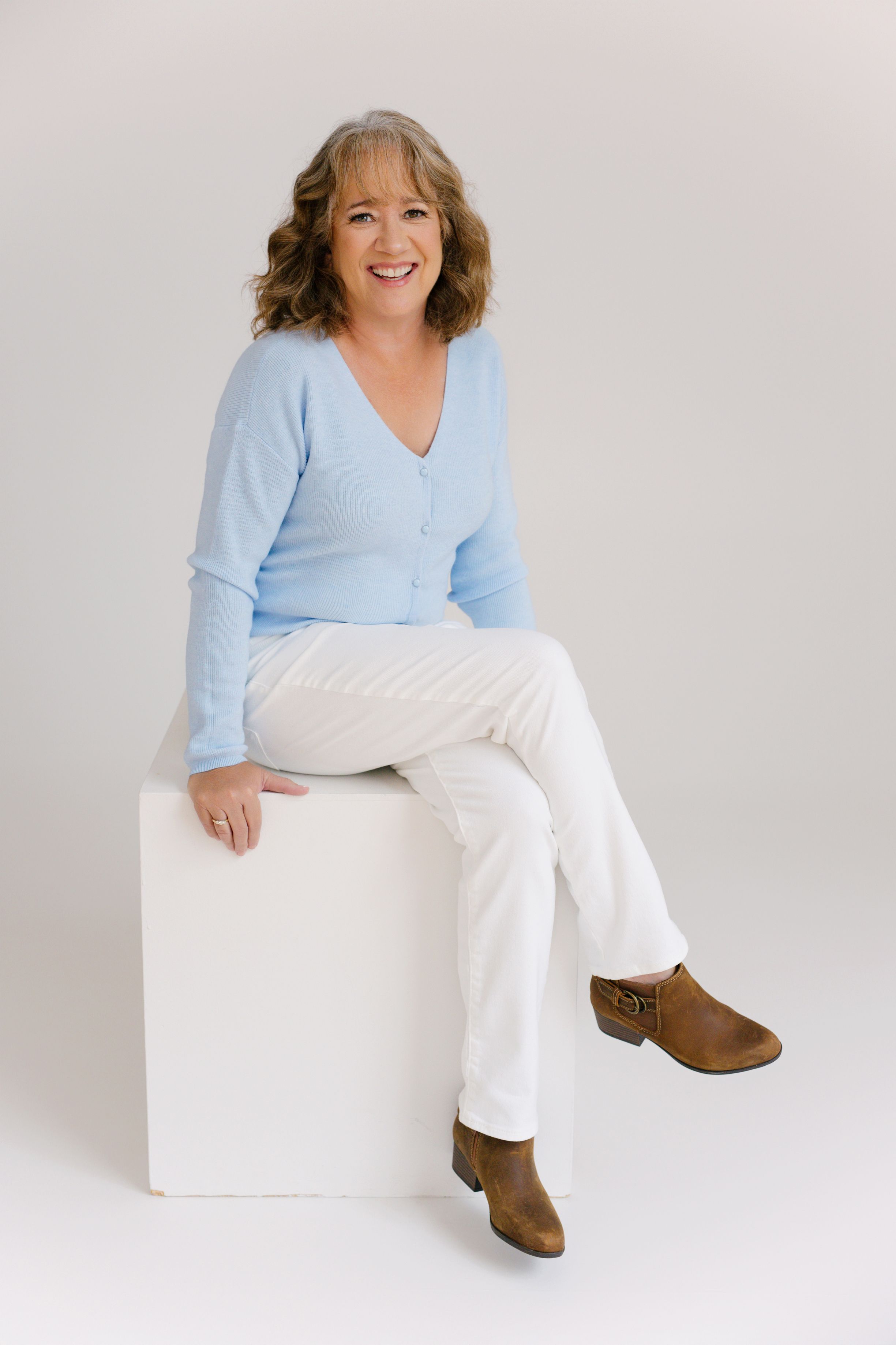 Carla Jacobson photo in blue sweater 