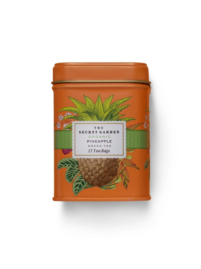 tea in a decorative tin on a white background for e-commerce product photo