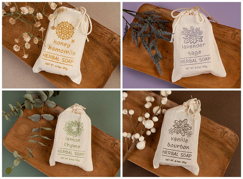 herbal soap in decorative canvas bags each on a wooden tray