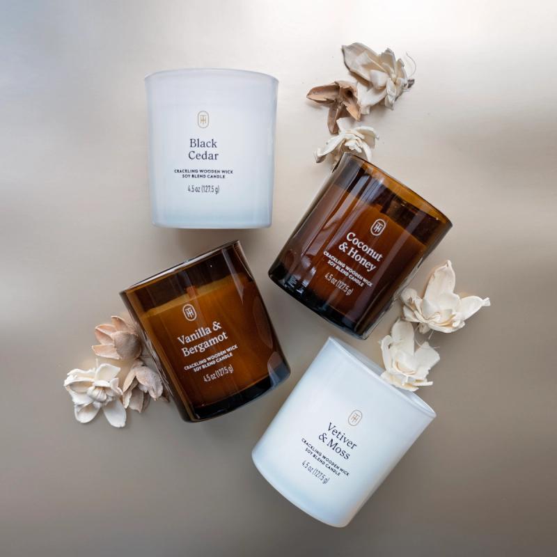 a variety of small votive candles in a product photo