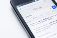 Photo of a mobile web browser with Google on the screen