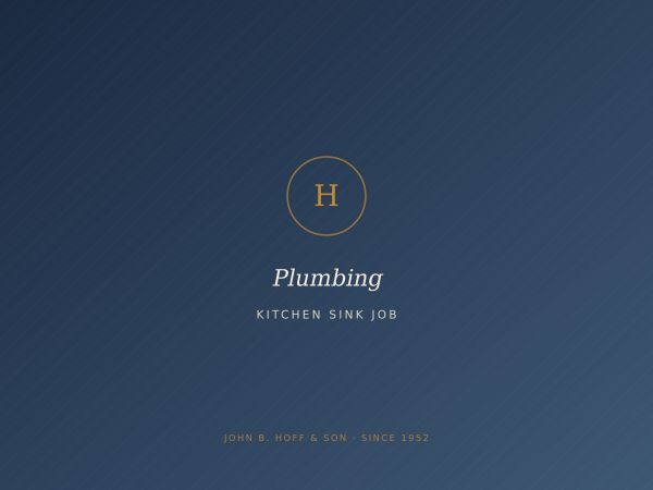 A copper P-trap and valves under a kitchen sink in a Lambertville home