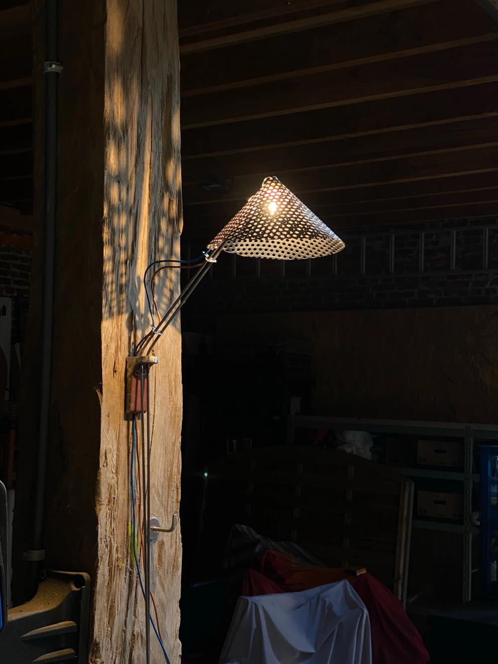 +PEACOCK LAMP: a wall lamp that plays with a naked re-use esthetic. Sourced from a local metal workshop and used the design and produce this lamp structure. 