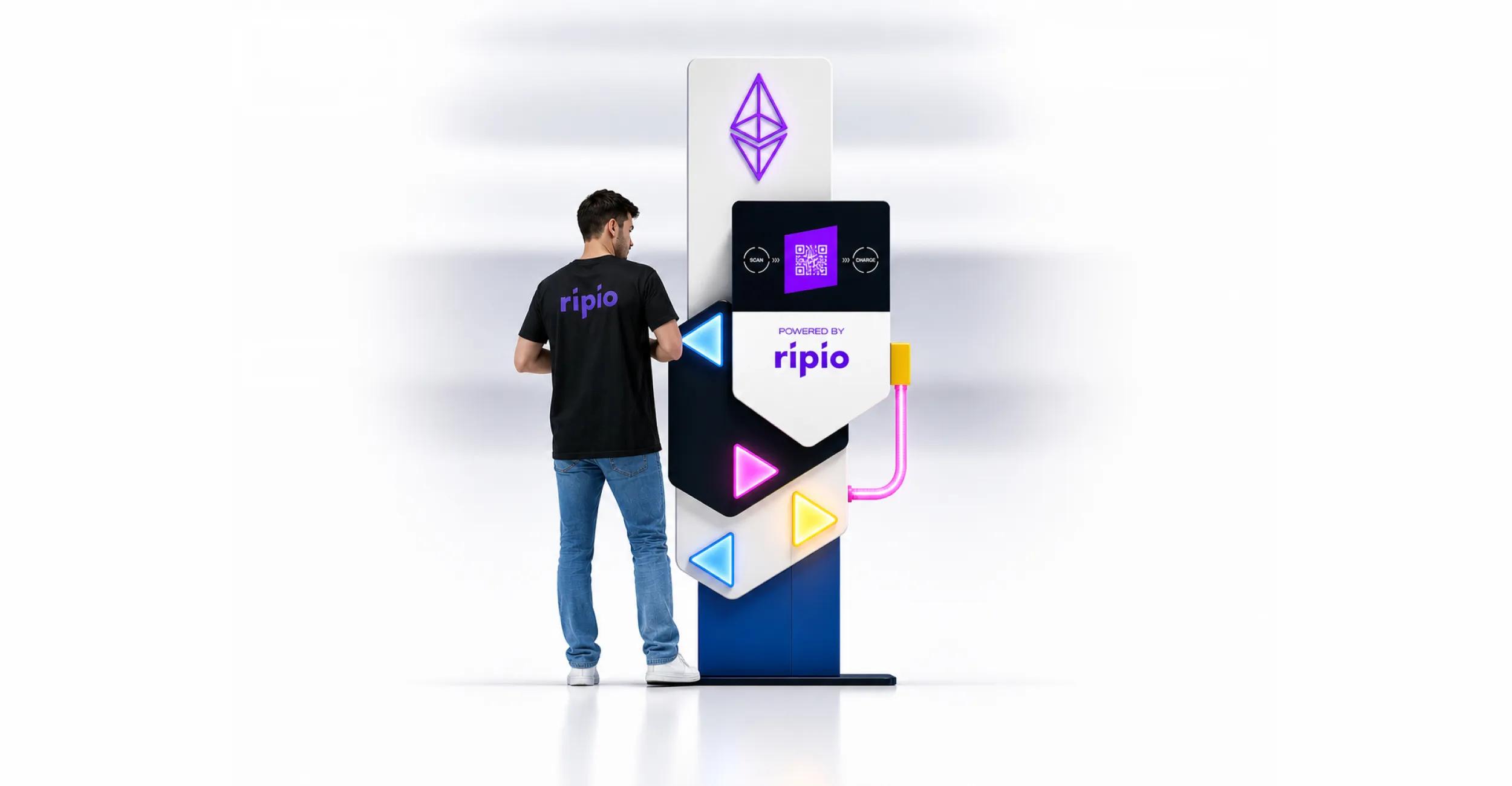 User interacting with Ripio industrial design totem built for Devconnect 2025