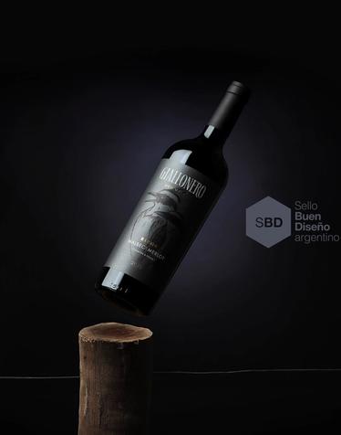 Wine bottle floating over a vineyard pole