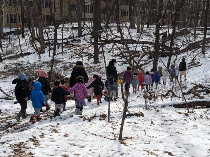 Preschoolers hiking in winter