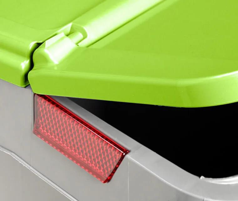 The front flap is hinged to the lid and equipped with a locking device that holds it open or closed.