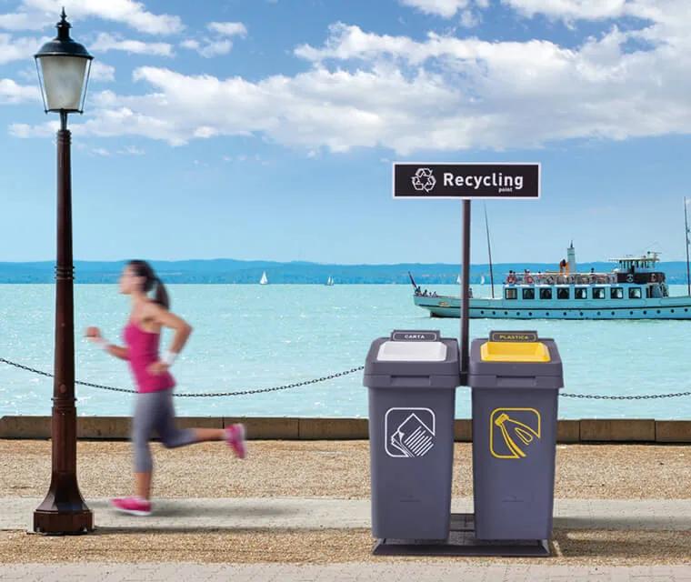 The structure of the recycling point for RE-SQUARE, which is designed to hold four containers, is made of hot galvanized steel and is supplied with refractive street signs and ballast.