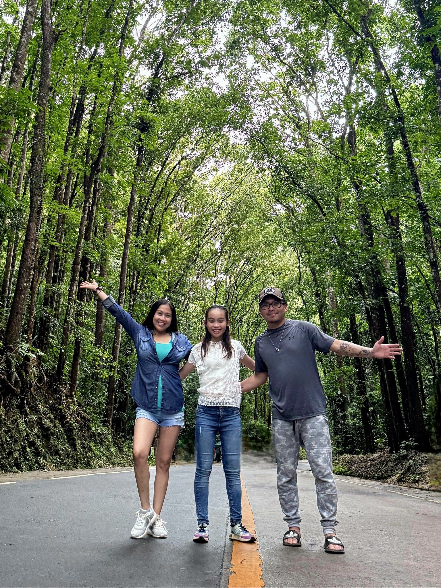 Laurence and his family during a visit to the Philippines last year, taking in a picturesque spot in Bohol, which is dedicated to growing its forests back