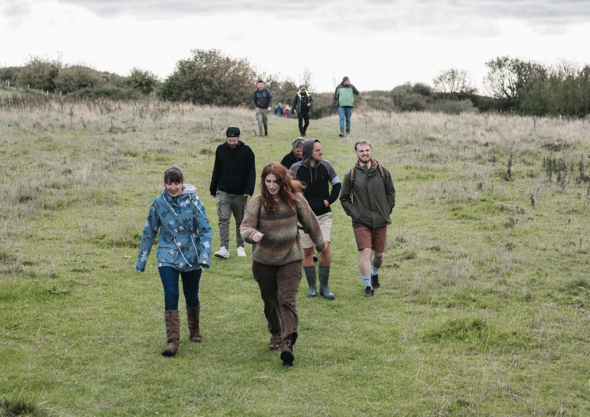 NOSY team walking together outdoors as part of community and sustainability initiatives