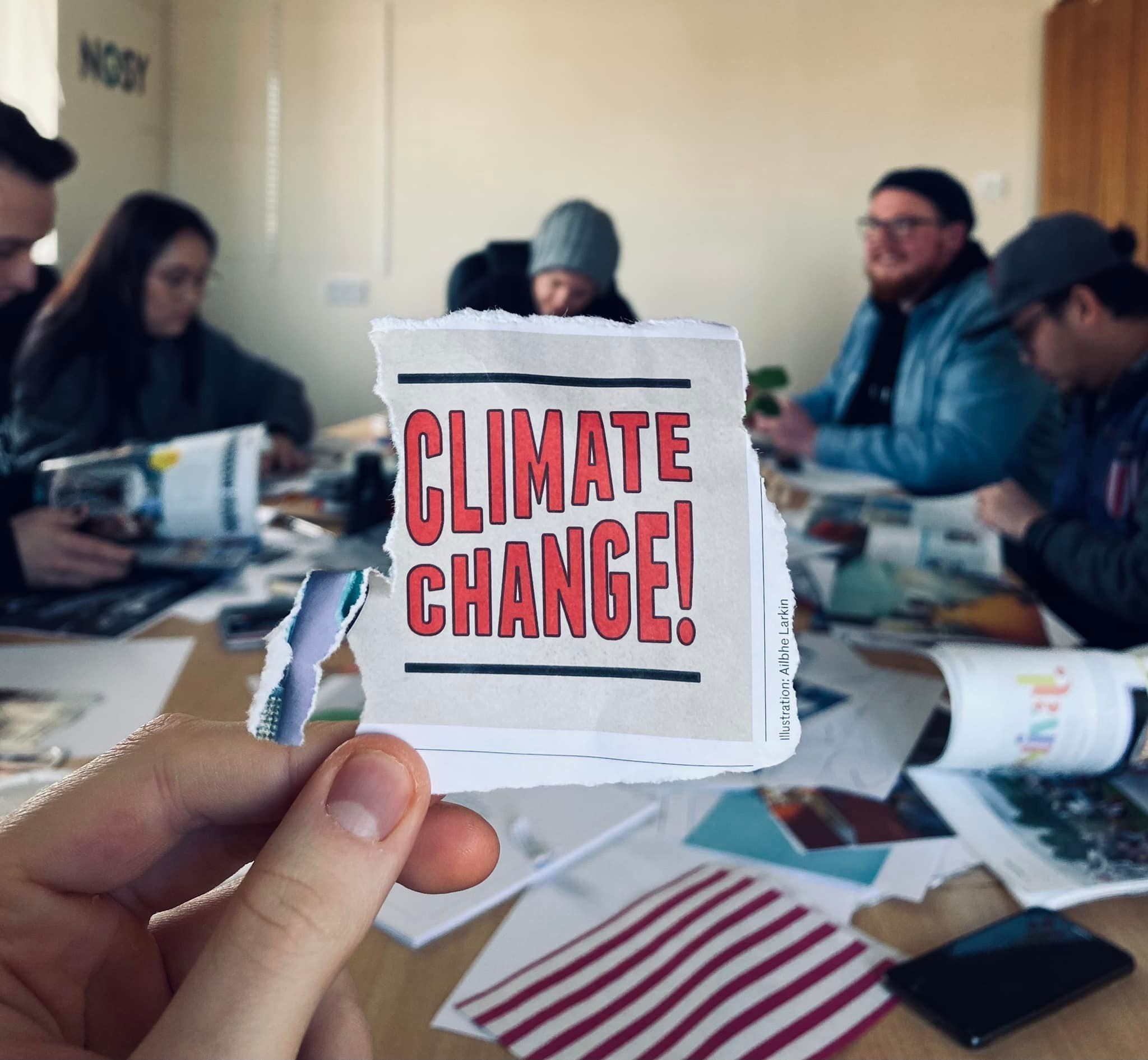 Paper pullout with headline "Climate Change"