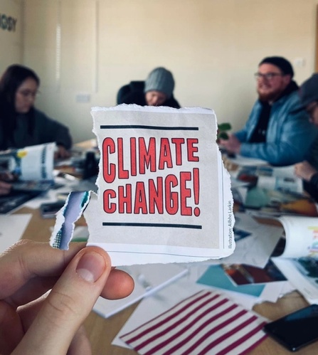 Paper pullout with headline "Climate Change"