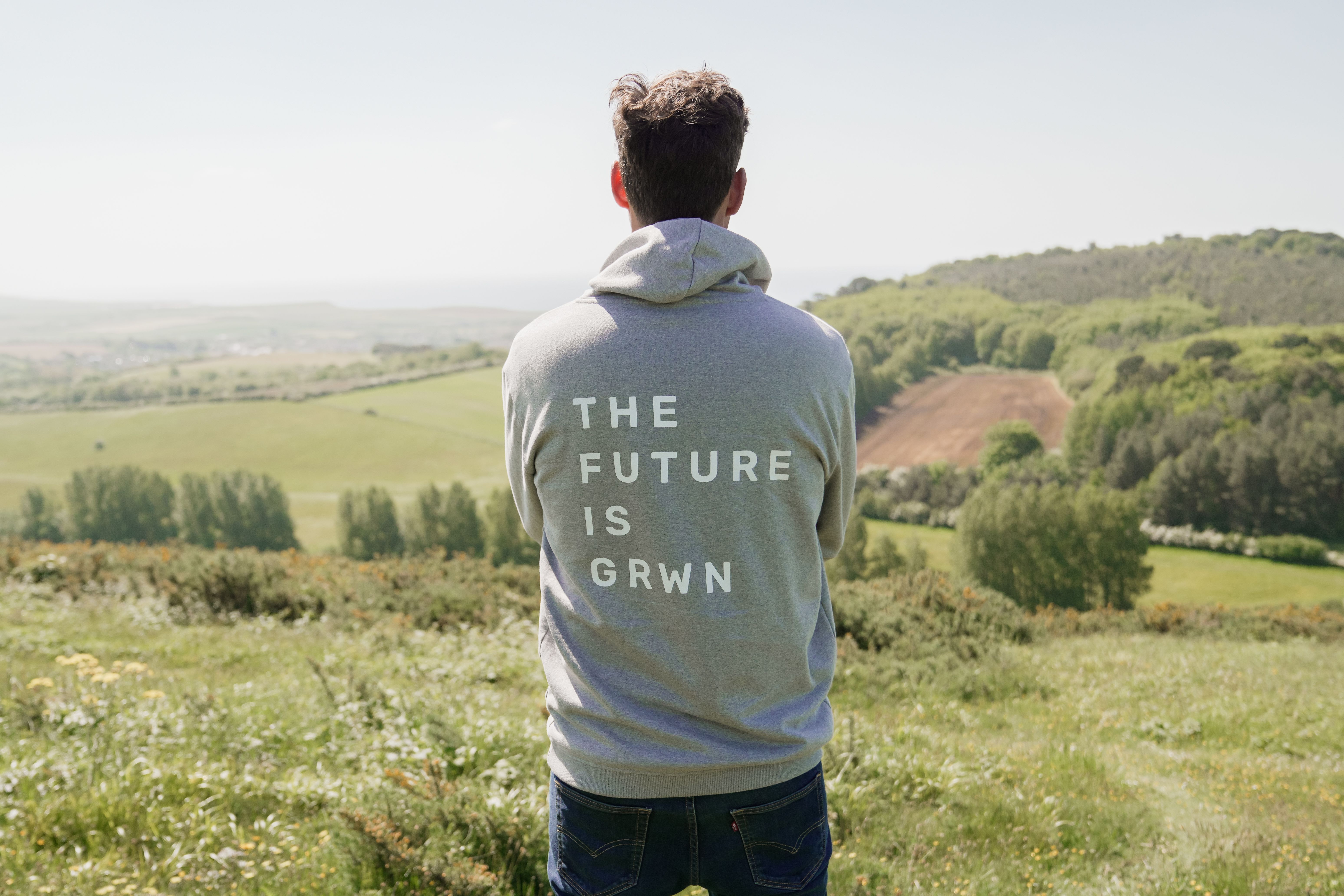 Nick Joyce, of GRWN Group, standing, overlooking the Isle of Wight countryside