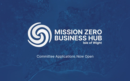 The Mission Zero Business Hub Logo on a blue background, overlooking the Isle of Wight