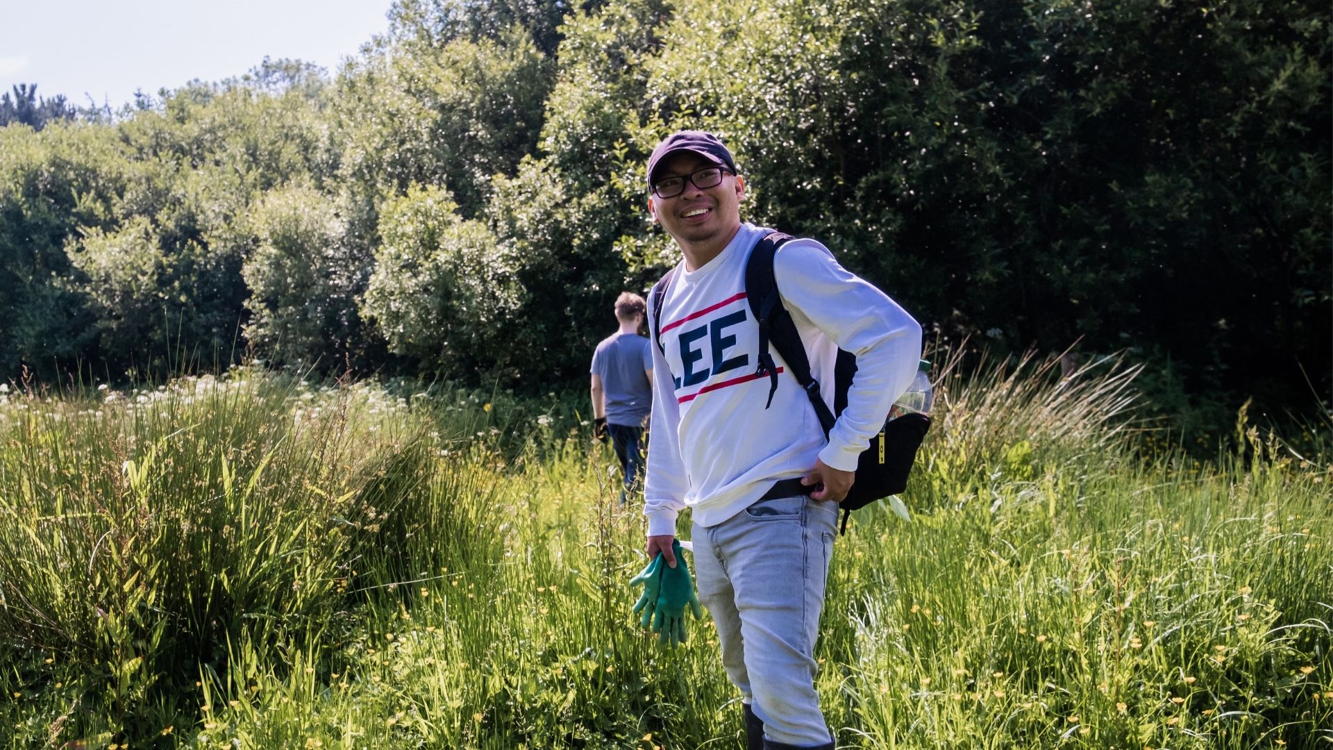 1% for the Planet logo next to a photo of a caterpillar