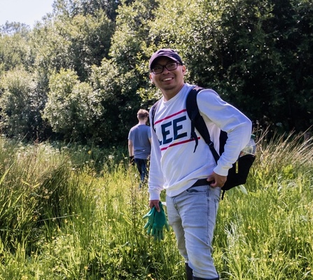 1% for the Planet logo next to a photo of a caterpillar