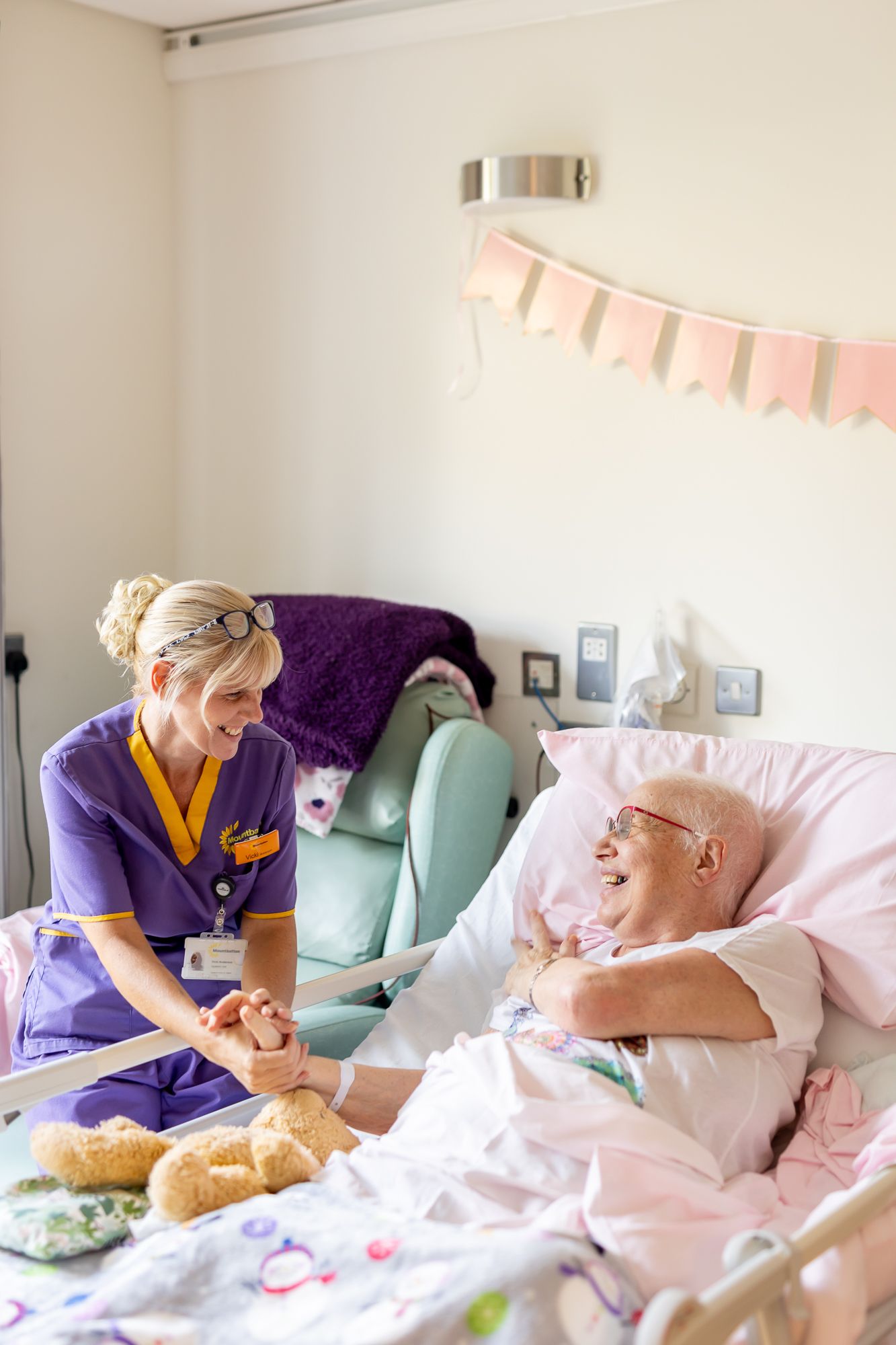 A Mountbatten nurse comforting a patient