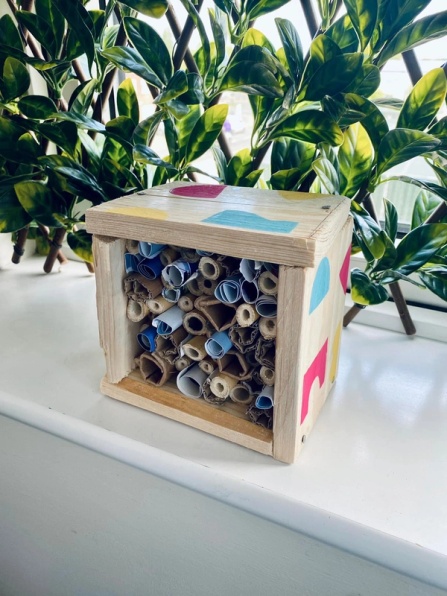 A bug hotel built from wood offcuts and sustainable materials