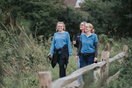 Three team members from the Hampshire and Isle of Wight Wildlife Trust