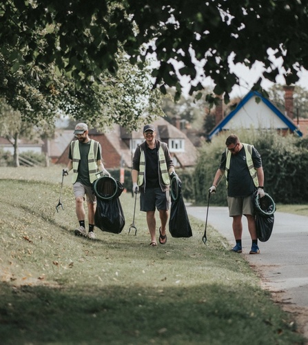 Richard Brimson, Aaron Bentley, Scott Bennett of NOSY chat while picking up litter