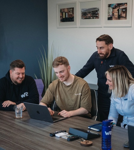 NOSY & WRS Systems team collaborating in a meeting