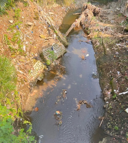 A river in the Philippines with various rubbish & plastic pollution