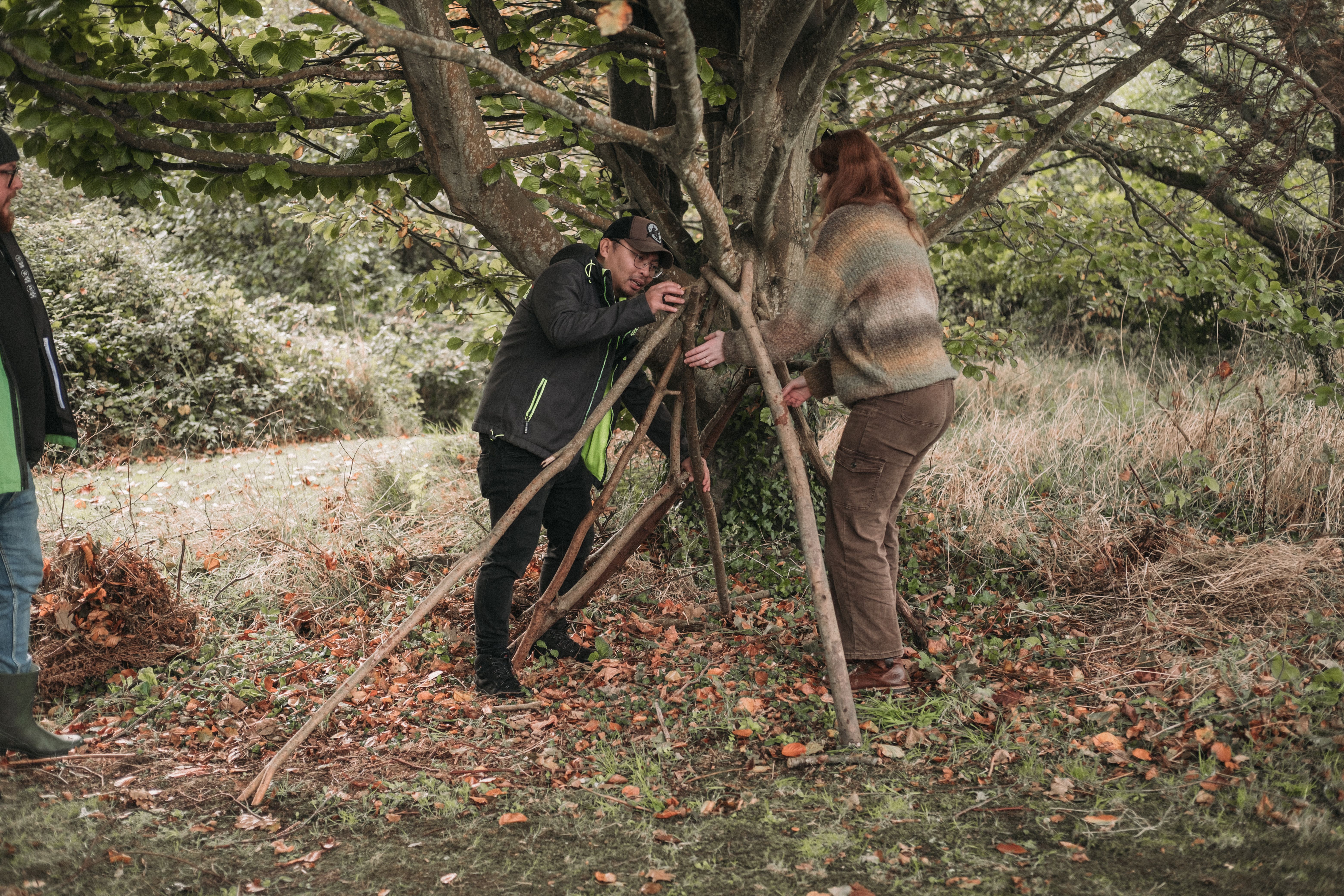 Solene & Laurence building a shelter at Sibbecks Farm