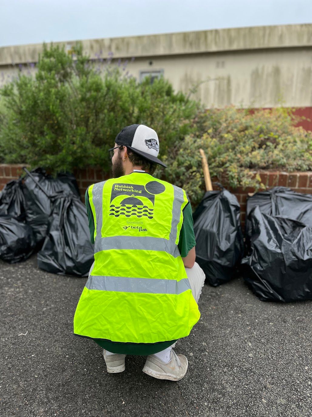 Richard from NOSY, counts the collected bags of rubbish from Seaclose Park, Newport