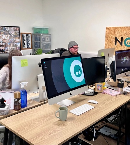 April, Scott, and Richard working at the new office at Building 41 in Northwood
