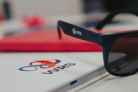 Promotional materials featuring the refreshed WRS branding